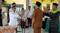 Kades Pagerwojo Melantik Perangkat Desa Kaur Keuangan Terpilih