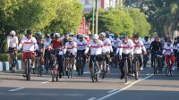 Meriahkan Hari Bhayangkara Ke-77, Polda Kalteng Gelar Fun Bike Dan Senam Bersama