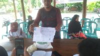 Pemdes Mojongapit Salurkan Bantuan Pangan Nasional di Pendopo Balai Desa