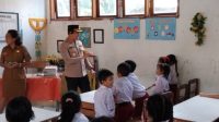 Polres Bitung Gelar Kegiatan Pemberian Makanan bergizi Gratis Untuk Anak – Anak Sekolah SD Katholik Stefanus Aertembaga