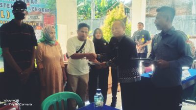 Penyerahan sertifikat program PTSL 2025 pada desa pasinan